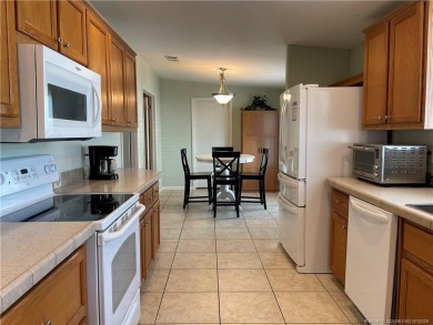 This home truly has it all! 3 bedrooms/2 bath + bonus room on Indianwood Golf and Country Club in Florida - for sale on GolfHomes.com, golf home, golf lot