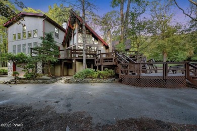 Situated on the golf course in Tanglwood Lakes, this stunning on Paupack Hills Golf and Country Club in Pennsylvania - for sale on GolfHomes.com, golf home, golf lot