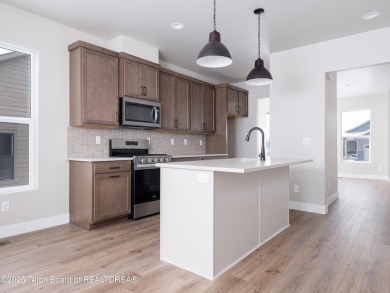 Ask about current builder incentives! Welcome to 283 Bald Eagle on Teton Reserve in Idaho - for sale on GolfHomes.com, golf home, golf lot