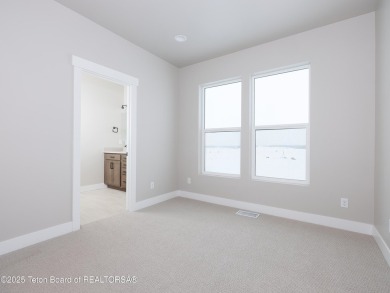 Ask about current builder incentives! Welcome to 283 Bald Eagle on Teton Reserve in Idaho - for sale on GolfHomes.com, golf home, golf lot