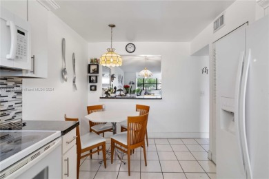 Located in the most exclusive, gated 55+ community of beautiful on Sunrise Lakes Phase IV Golf Course in Florida - for sale on GolfHomes.com, golf home, golf lot