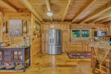 Stunning custom-built log chalet in desirable Eagle Rock Resort on Eagle Rock Golf and Ski Resort in Pennsylvania - for sale on GolfHomes.com, golf home, golf lot