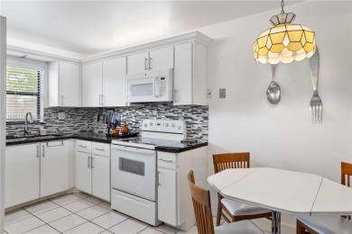 Located in the most exclusive, gated 55+ community of beautiful on Sunrise Lakes Phase IV Golf Course in Florida - for sale on GolfHomes.com, golf home, golf lot