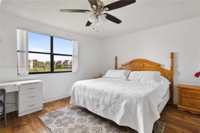 Located in the most exclusive, gated 55+ community of beautiful on Sunrise Lakes Phase IV Golf Course in Florida - for sale on GolfHomes.com, golf home, golf lot