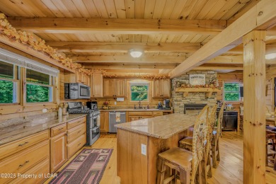 Stunning custom-built log chalet in desirable Eagle Rock Resort on Eagle Rock Golf and Ski Resort in Pennsylvania - for sale on GolfHomes.com, golf home, golf lot