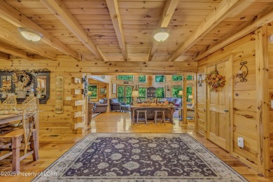 Stunning custom-built log chalet in desirable Eagle Rock Resort on Eagle Rock Golf and Ski Resort in Pennsylvania - for sale on GolfHomes.com, golf home, golf lot