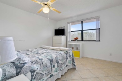 Located in the most exclusive, gated 55+ community of beautiful on Sunrise Lakes Phase IV Golf Course in Florida - for sale on GolfHomes.com, golf home, golf lot