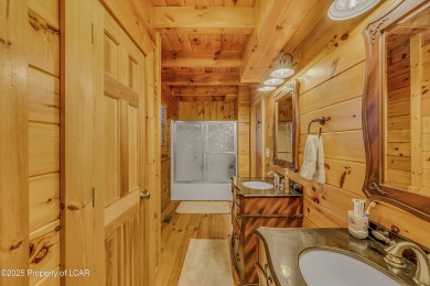 Stunning custom-built log chalet in desirable Eagle Rock Resort on Eagle Rock Golf and Ski Resort in Pennsylvania - for sale on GolfHomes.com, golf home, golf lot