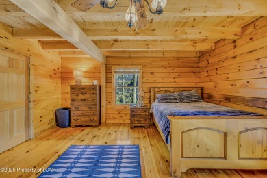 Stunning custom-built log chalet in desirable Eagle Rock Resort on Eagle Rock Golf and Ski Resort in Pennsylvania - for sale on GolfHomes.com, golf home, golf lot
