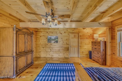Stunning custom-built log chalet in desirable Eagle Rock Resort on Eagle Rock Golf and Ski Resort in Pennsylvania - for sale on GolfHomes.com, golf home, golf lot