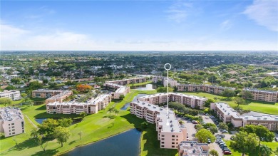 Located in the most exclusive, gated 55+ community of beautiful on Sunrise Lakes Phase IV Golf Course in Florida - for sale on GolfHomes.com, golf home, golf lot