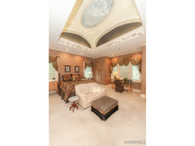 Step into the timeless elegance of this French Provincial on Wynlakes Golf and Country Club in Alabama - for sale on GolfHomes.com, golf home, golf lot