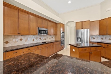 Stunning 4BR/3.5BA + den pool home in sought-after PGA Village on The Legacy Golf and Tennis Club in Florida - for sale on GolfHomes.com, golf home, golf lot