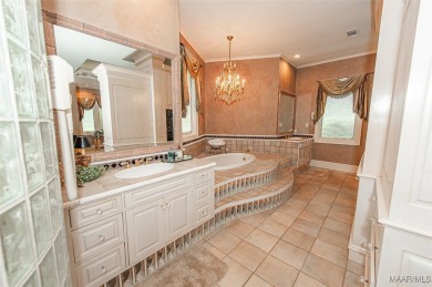 Step into the timeless elegance of this French Provincial on Wynlakes Golf and Country Club in Alabama - for sale on GolfHomes.com, golf home, golf lot