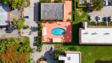 Located in the most exclusive, gated 55+ community of beautiful on Sunrise Lakes Phase IV Golf Course in Florida - for sale on GolfHomes.com, golf home, golf lot