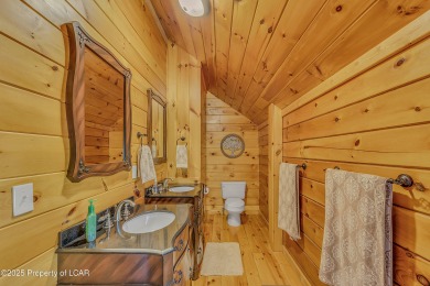 Stunning custom-built log chalet in desirable Eagle Rock Resort on Eagle Rock Golf and Ski Resort in Pennsylvania - for sale on GolfHomes.com, golf home, golf lot