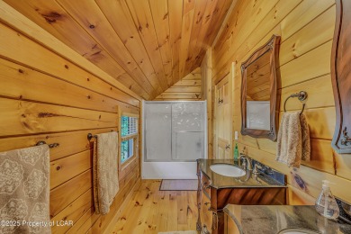 Stunning custom-built log chalet in desirable Eagle Rock Resort on Eagle Rock Golf and Ski Resort in Pennsylvania - for sale on GolfHomes.com, golf home, golf lot