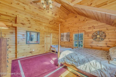Stunning custom-built log chalet in desirable Eagle Rock Resort on Eagle Rock Golf and Ski Resort in Pennsylvania - for sale on GolfHomes.com, golf home, golf lot
