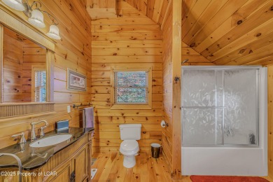 Stunning custom-built log chalet in desirable Eagle Rock Resort on Eagle Rock Golf and Ski Resort in Pennsylvania - for sale on GolfHomes.com, golf home, golf lot