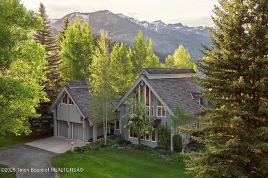 Bordering the 11th fairway of the prestigious Teton Pines golf on Teton Pines Golf Club in Wyoming - for sale on GolfHomes.com, golf home, golf lot