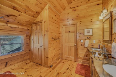 Stunning custom-built log chalet in desirable Eagle Rock Resort on Eagle Rock Golf and Ski Resort in Pennsylvania - for sale on GolfHomes.com, golf home, golf lot