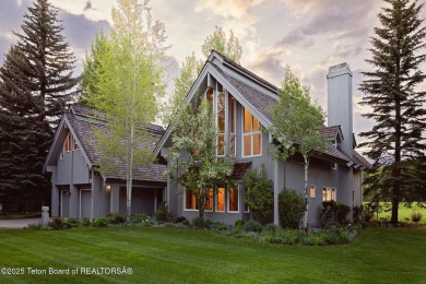 Bordering the 11th fairway of the prestigious Teton Pines golf on Teton Pines Golf Club in Wyoming - for sale on GolfHomes.com, golf home, golf lot