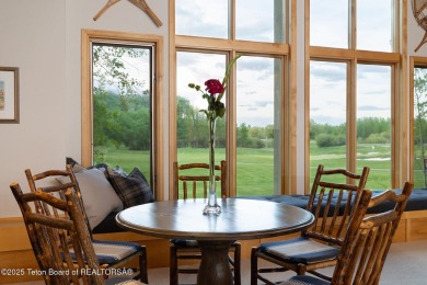 Bordering the 11th fairway of the prestigious Teton Pines golf on Teton Pines Golf Club in Wyoming - for sale on GolfHomes.com, golf home, golf lot