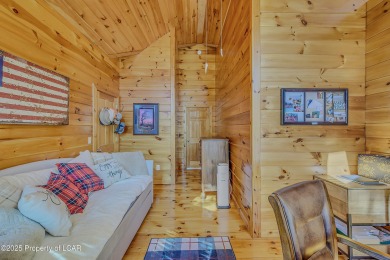 Stunning custom-built log chalet in desirable Eagle Rock Resort on Eagle Rock Golf and Ski Resort in Pennsylvania - for sale on GolfHomes.com, golf home, golf lot