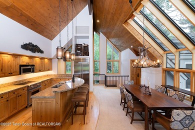 Bordering the 11th fairway of the prestigious Teton Pines golf on Teton Pines Golf Club in Wyoming - for sale on GolfHomes.com, golf home, golf lot