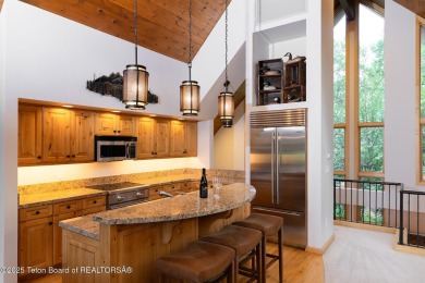 Bordering the 11th fairway of the prestigious Teton Pines golf on Teton Pines Golf Club in Wyoming - for sale on GolfHomes.com, golf home, golf lot