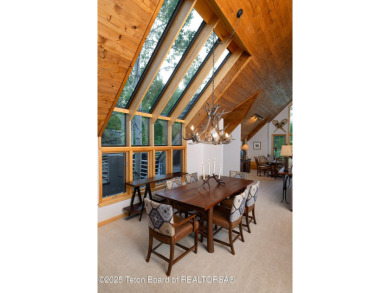 Bordering the 11th fairway of the prestigious Teton Pines golf on Teton Pines Golf Club in Wyoming - for sale on GolfHomes.com, golf home, golf lot