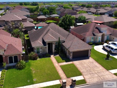 Experience the best of Edinburg living in this stunning 4 bed/3 on Los Lagos Golf Club in Texas - for sale on GolfHomes.com, golf home, golf lot