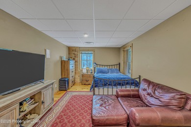 Stunning custom-built log chalet in desirable Eagle Rock Resort on Eagle Rock Golf and Ski Resort in Pennsylvania - for sale on GolfHomes.com, golf home, golf lot