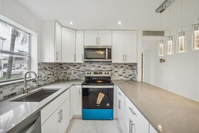 Beautifully remodeled first-floor 2-bedroom, 2-bath unit located on Kings Point Golf -Flanders Way in Florida - for sale on GolfHomes.com, golf home, golf lot