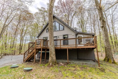 Tucked away in the serene heart of the Lake Wallenpaupack region on Paupack Hills Golf and Country Club in Pennsylvania - for sale on GolfHomes.com, golf home, golf lot