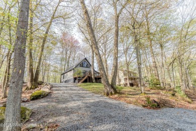Tucked away in the serene heart of the Lake Wallenpaupack region on Paupack Hills Golf and Country Club in Pennsylvania - for sale on GolfHomes.com, golf home, golf lot