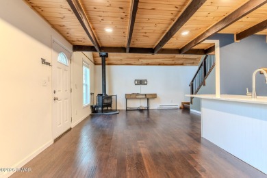 Tucked away in the serene heart of the Lake Wallenpaupack region on Paupack Hills Golf and Country Club in Pennsylvania - for sale on GolfHomes.com, golf home, golf lot