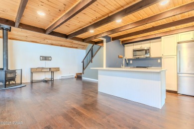 Tucked away in the serene heart of the Lake Wallenpaupack region on Paupack Hills Golf and Country Club in Pennsylvania - for sale on GolfHomes.com, golf home, golf lot