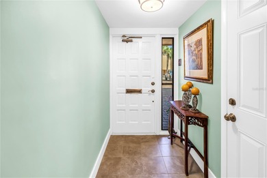 Welcome to coastal living in Treasure Island, a true Norman on Treasure Bay Golf and Tennis in Florida - for sale on GolfHomes.com, golf home, golf lot