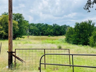 10 GORGEOUS acres with a deep tank, perimeter fences and a on Lakeside Country Club in Texas - for sale on GolfHomes.com, golf home, golf lot