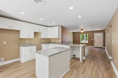 Welcome to this beautifully designed 2025-built home in the on Williston Highlands Golf and Country Club in Florida - for sale on GolfHomes.com, golf home, golf lot