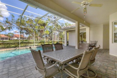 Lovely, furnished pool home in Pelican Pointe.  This is a great on Pelican Pointe Golf and Country Club in Florida - for sale on GolfHomes.com, golf home, golf lot