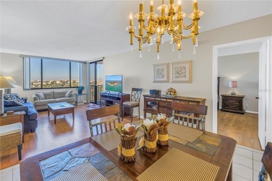 Move-in ready and fully furnished, this spacious 2-bed, 2-bath on Isla Del Sol Yacht and Country Club in Florida - for sale on GolfHomes.com, golf home, golf lot