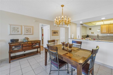 Move-in ready and fully furnished, this spacious 2-bed, 2-bath on Isla Del Sol Yacht and Country Club in Florida - for sale on GolfHomes.com, golf home, golf lot