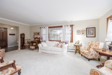 EDGEWATER CHARM IN NASSAU SHORES--THIS ONE'S HARD TO IGNORE! on Peninsula Golf Club in New York - for sale on GolfHomes.com, golf home, golf lot