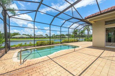 This STUNNING home in the highly sought-after Gateway community on Gateway Golf and Country Club in Florida - for sale on GolfHomes.com, golf home, golf lot