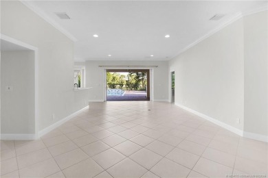Beautiful and move-in ready CBS one-story pool home is privately on Eagle Marsh Golf Club in Florida - for sale on GolfHomes.com, golf home, golf lot