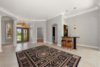 This STUNNING home in the highly sought-after Gateway community on Gateway Golf and Country Club in Florida - for sale on GolfHomes.com, golf home, golf lot