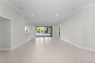 Beautiful and move-in ready CBS one-story pool home is privately on Eagle Marsh Golf Club in Florida - for sale on GolfHomes.com, golf home, golf lot