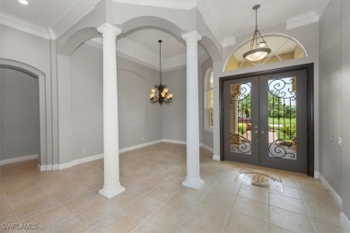 This STUNNING home in the highly sought-after Gateway community on Gateway Golf and Country Club in Florida - for sale on GolfHomes.com, golf home, golf lot